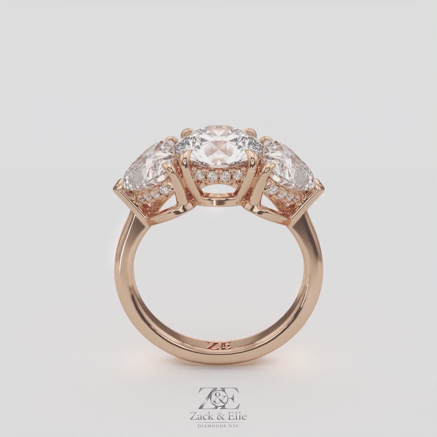 4.15 Ct D VS1 Round 3 Stone Ring With Heart Shape Accents and Halo, in white gold, 360 spin
