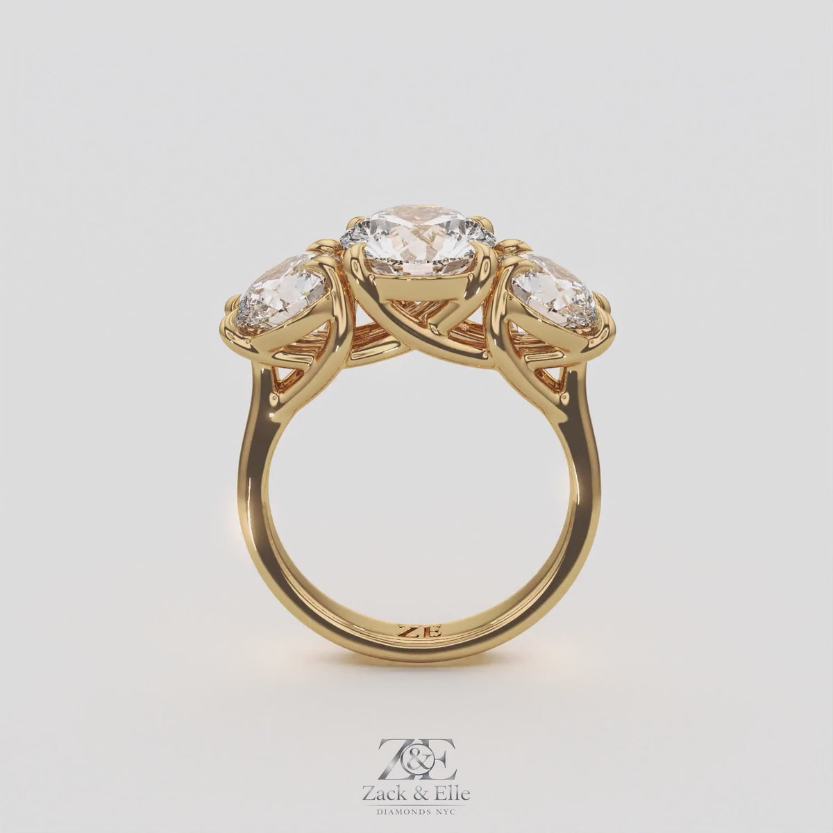 4.00 Ct D Color VS1 Round Lab Grown Diamond 3 Stone Ring, in yellow gold, 360 spin
