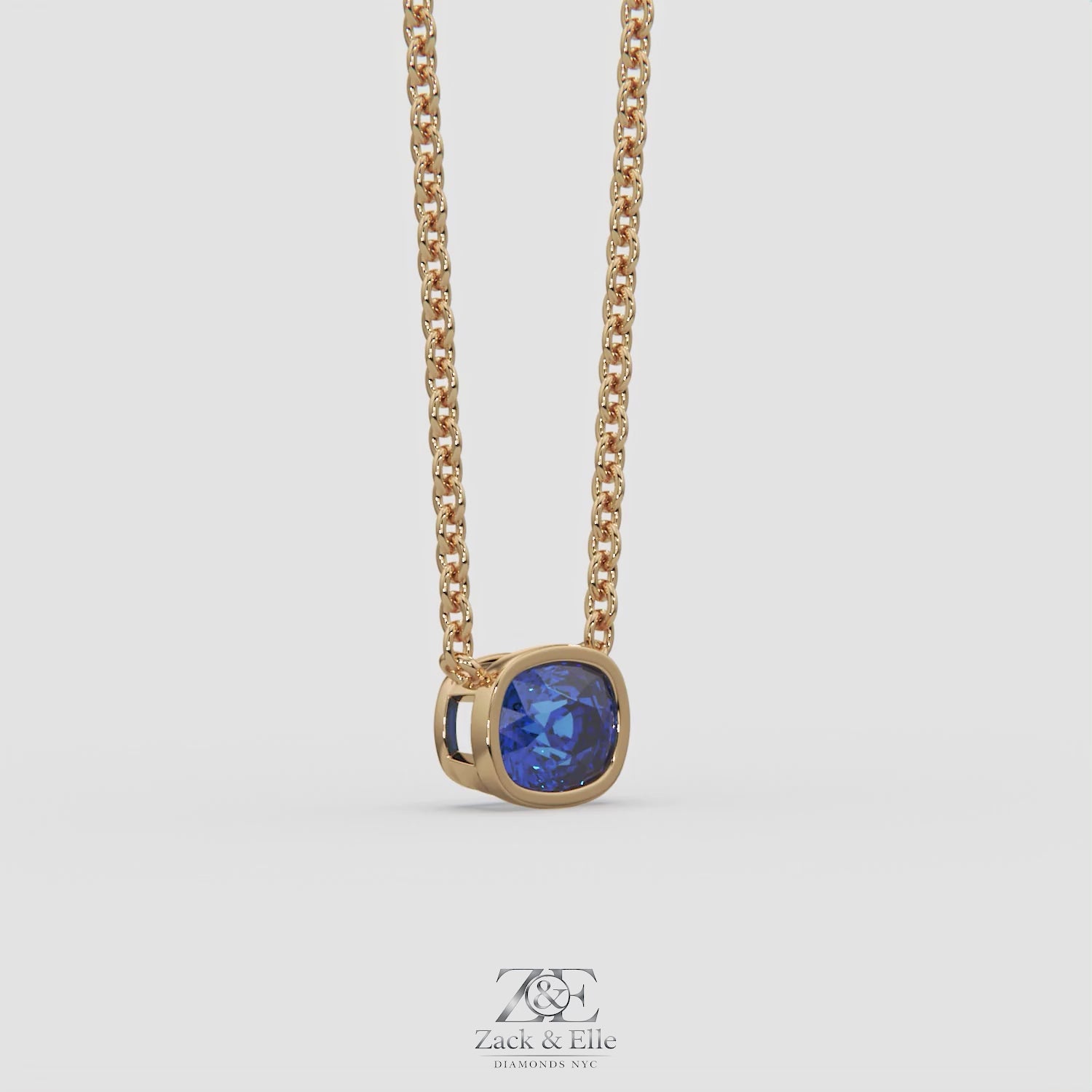 3.00 Ct Cushion Blue Sapphire East West Pendant, in yellow gold, 360 spin