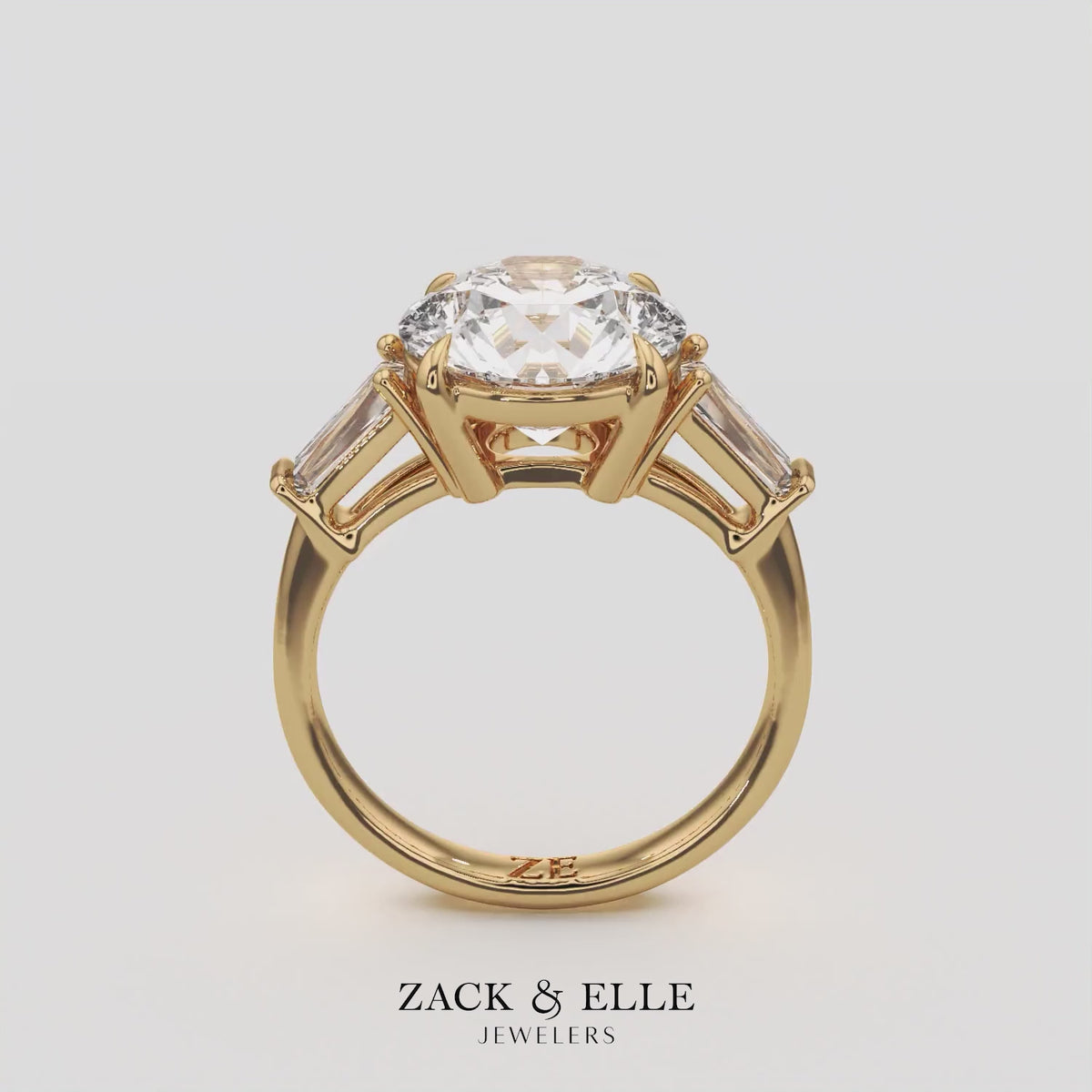 2.40 Ct D Color VS1 Round Diamond Three Stone Ring With Tapered Baguettes, in yellow gold, 360 spin