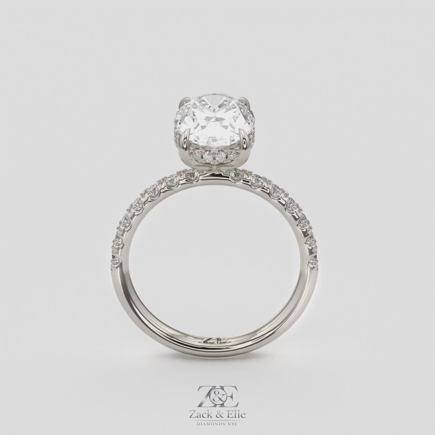 3.50 Ct E VS1 Oval Lab Grown Diamond Halo Ring, in white gold, 360 spin