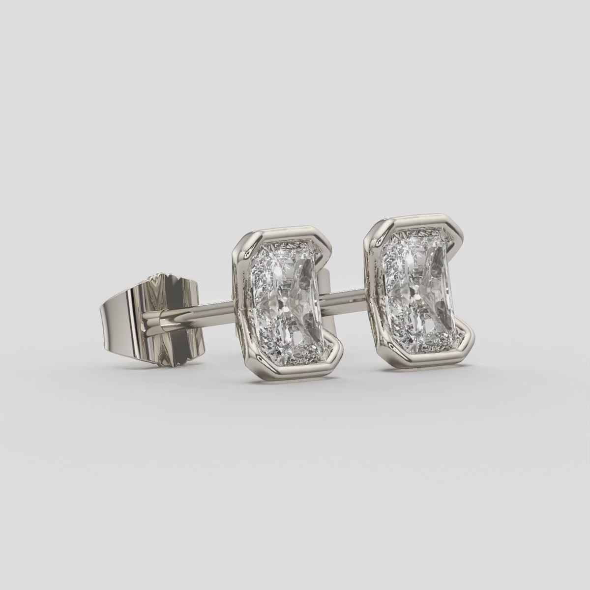 2.00 Ct E Color VS1 Radiant Cut Half-Bezel Stud Earrings, in white gold, 360 spin