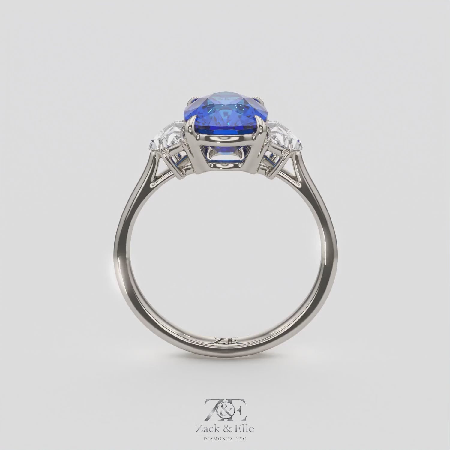 4.00 Ct Cushion Blue Sapphire and Diamond Three Stone Ring, in white gold, 360 spin