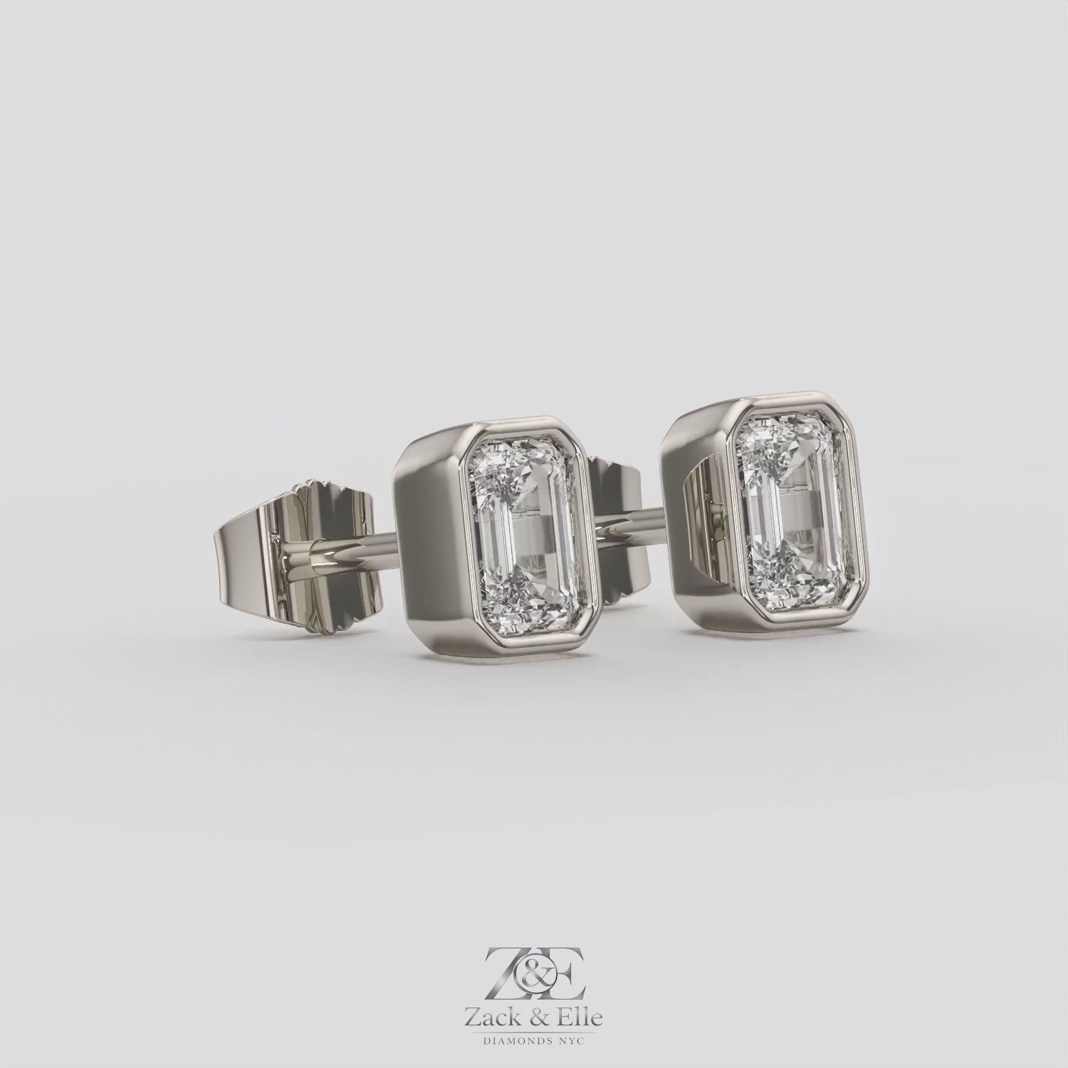 2.00 Ct E VS1 Emerald Cut Full Bezel Lab Grown Diamond Studs, in white gold, 360 spin