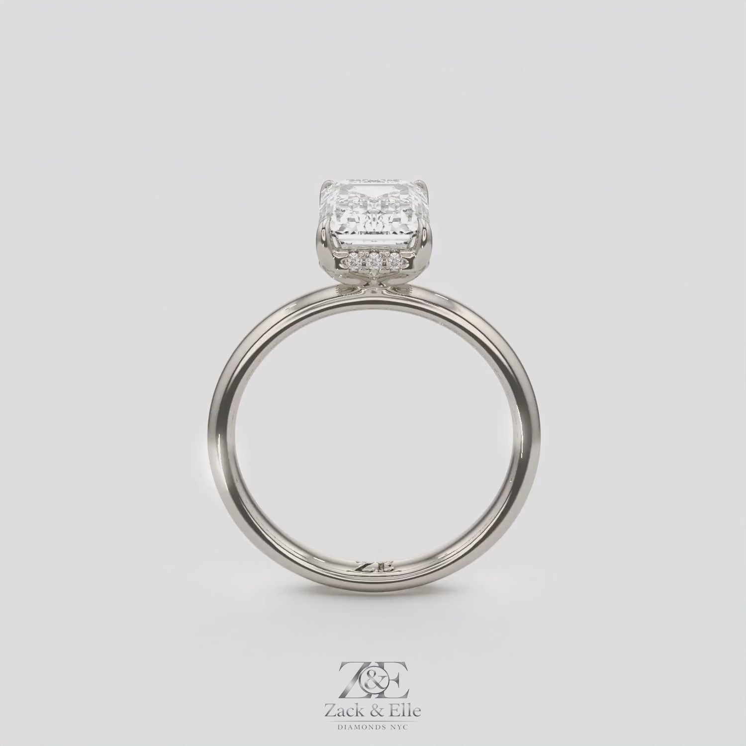 2.60 Ct E VS1 Emerald Cut Lab Grown Diamond Halo Ring, in white gold, 360 spin