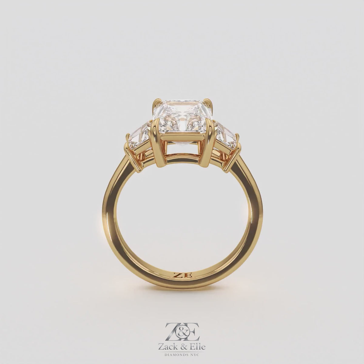 3.50 Ct D VS1 Radiant Cut Lab-Grown Diamond Three Stone Ring With Trapezoid Accents, in yellow gold, 360 spin