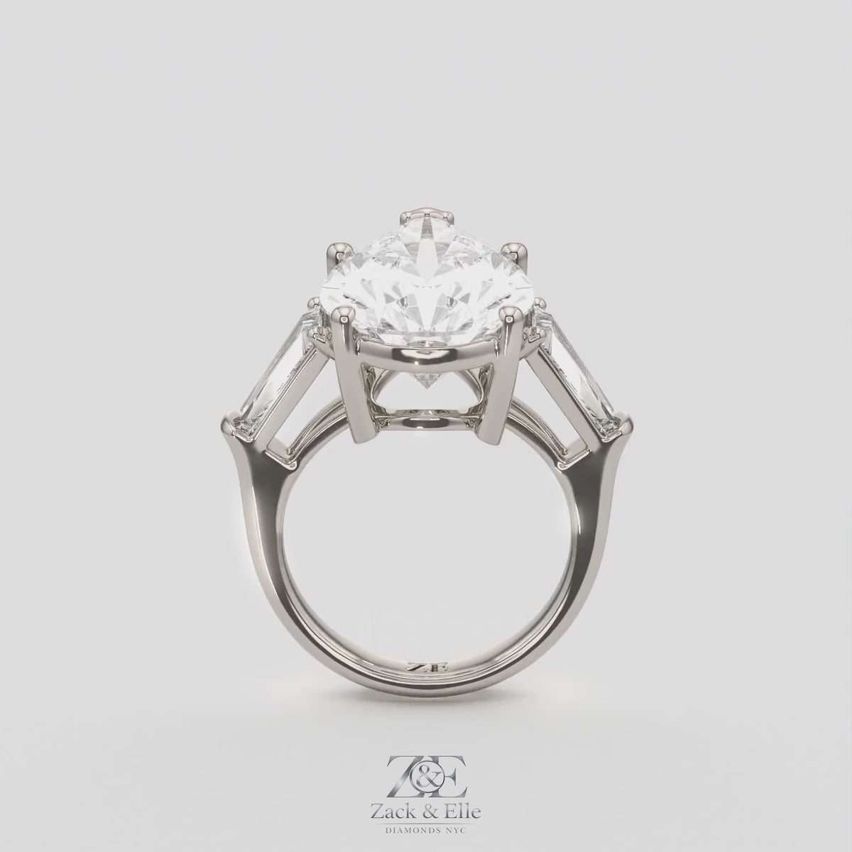 11.50 Ct F Color VS1 Pear Shape Diamond Three Stone Ring With Tapered Baguettes, in white gold, 360 spin