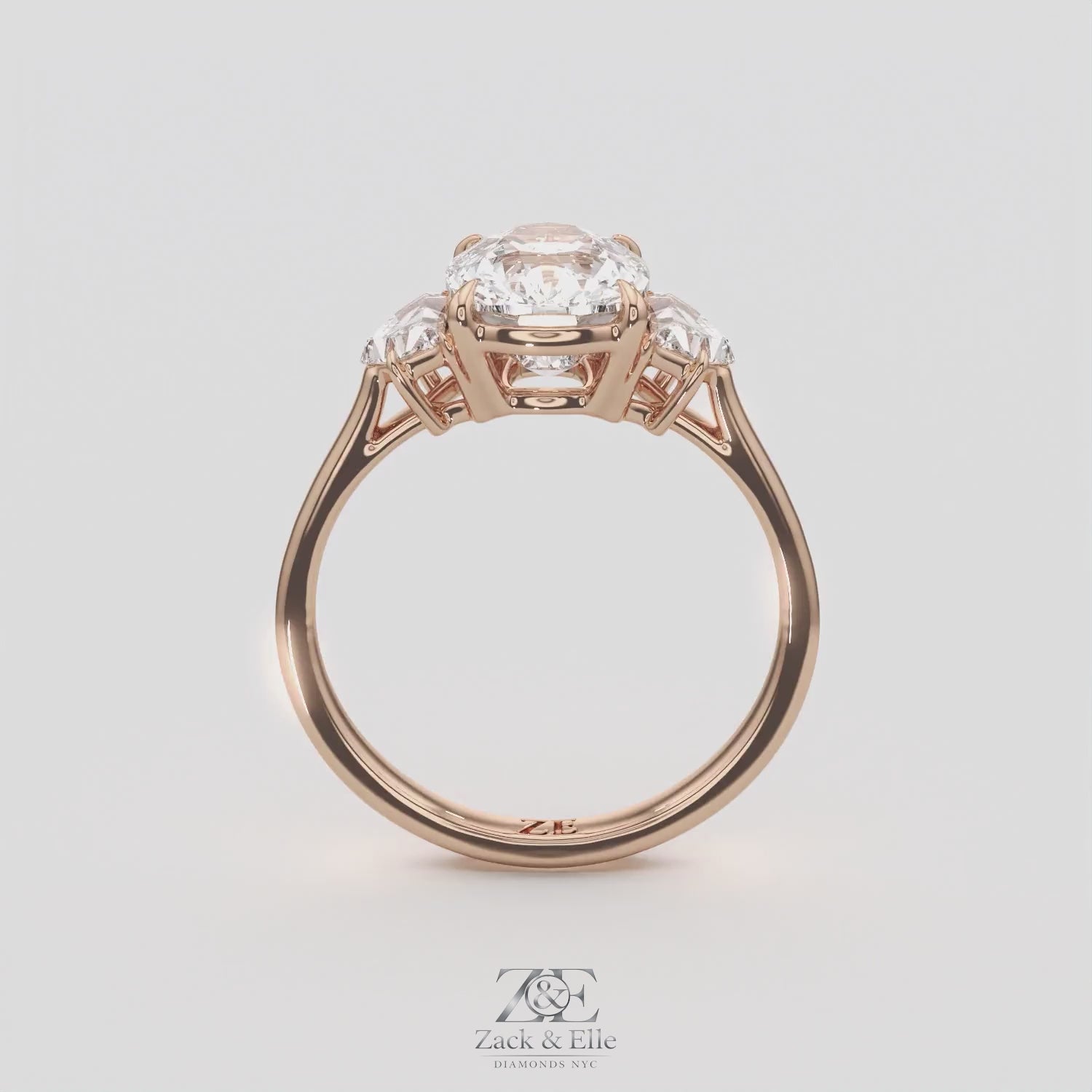 3.50 Ct E VS1 Cushion Lab Grown Diamond Three Stone Ring, in rose gold, 360 spin