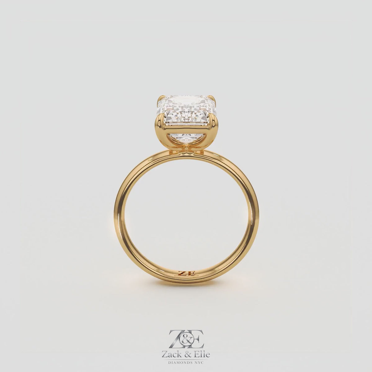 4.00 Ct D VS1 Emerald Cut Lab-Grown Diamond Solitaire Ring, in yellow gold, 360 spin