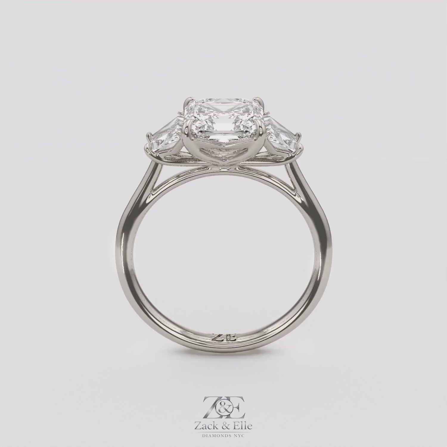 2.50 Ct D VS1 Asscher Cut Three Stone Ring With Step Cut Trapezoid Accents, in white gold, 360 spin