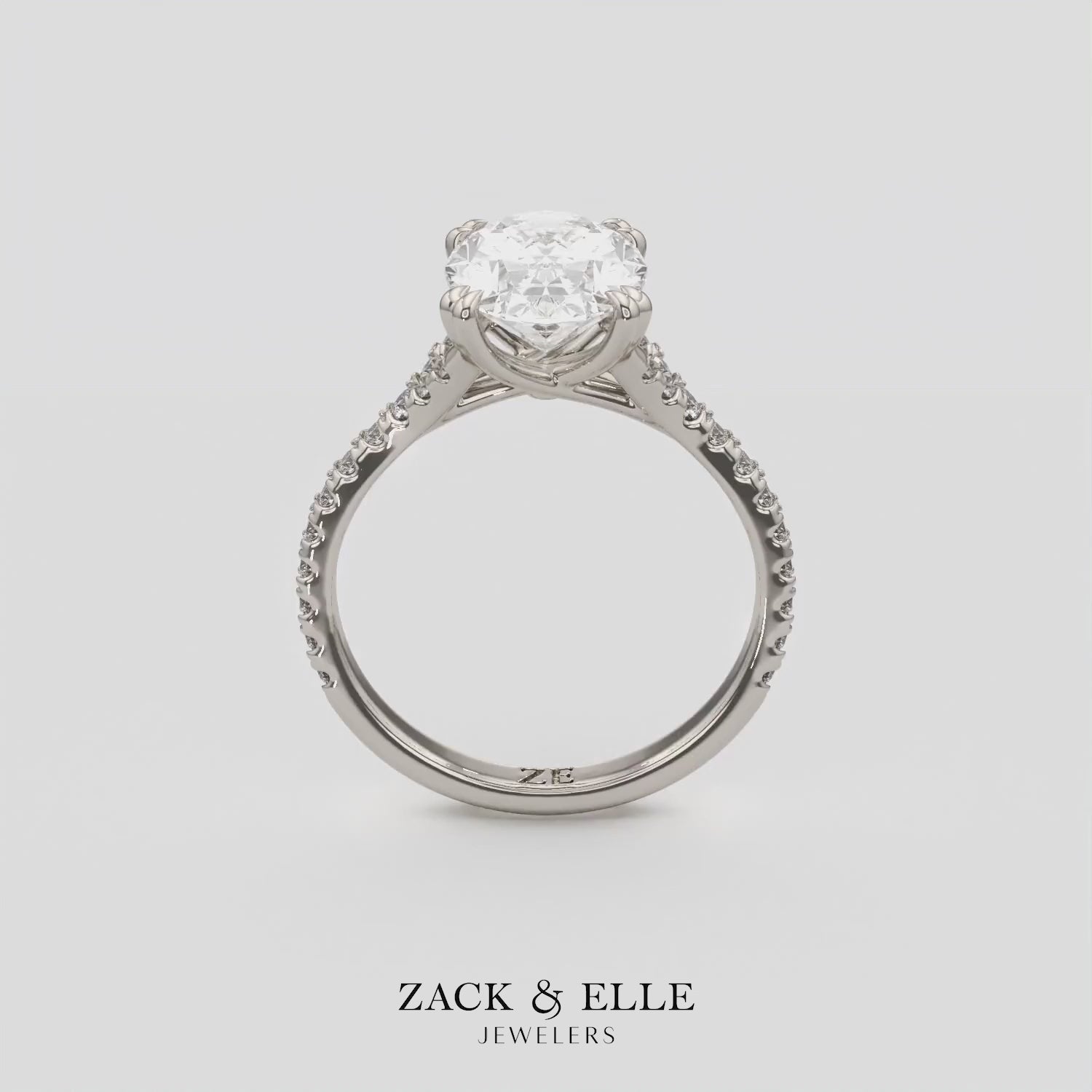 3.40 Ct E VS1 Oval Lab Diamond Side Stone Engagement Ring, in white gold, 360 spin