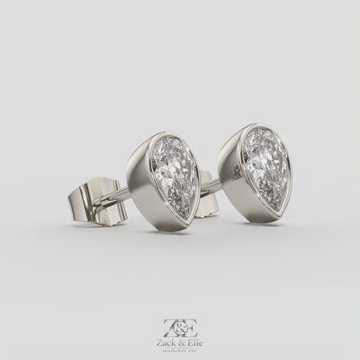 2.00 Ct E VS1 Pear Shaped Full Bezel Lab Grown Diamond Studs, in white gold, 360 spin
