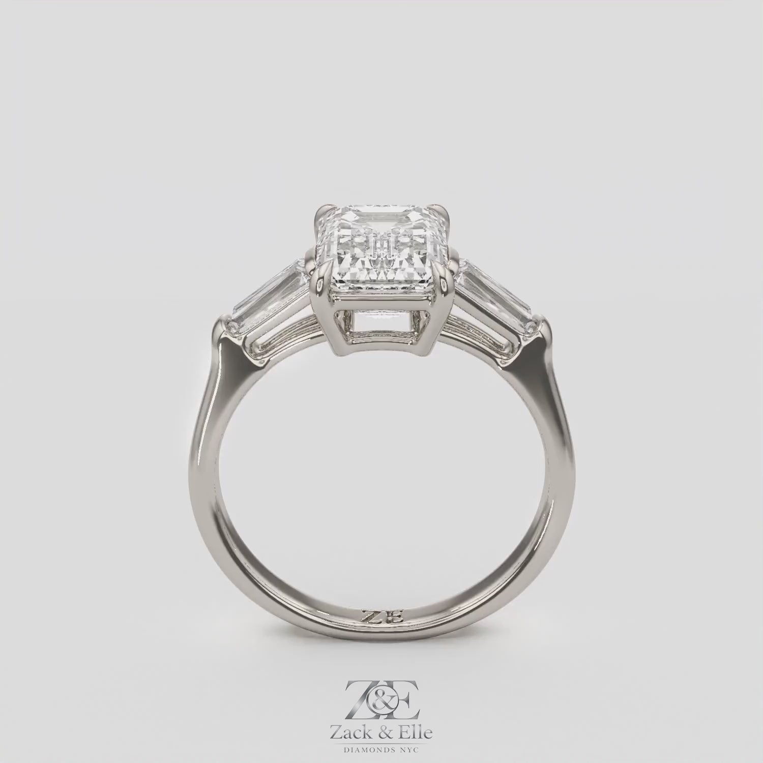 3.50 Ct D Color VS1 Emerald Cut Three Stone Diamond Ring With Tapered Baguettes, in white gold, 360 spin
