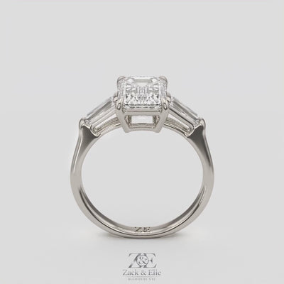 3.50 Ct D Color VS1 Emerald Cut Three Stone Diamond Ring With Tapered Baguettes, in white gold, 360 spin