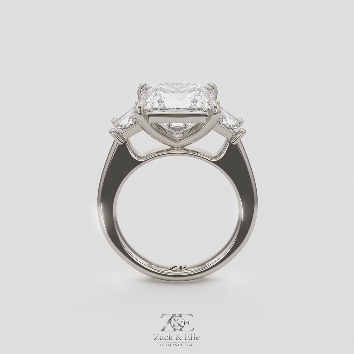 4.60 Ct E VS1 Princess Cut Lab-Grown Diamond Three Stone Ring with Trapezoid Accents, in white gold, 360 spin