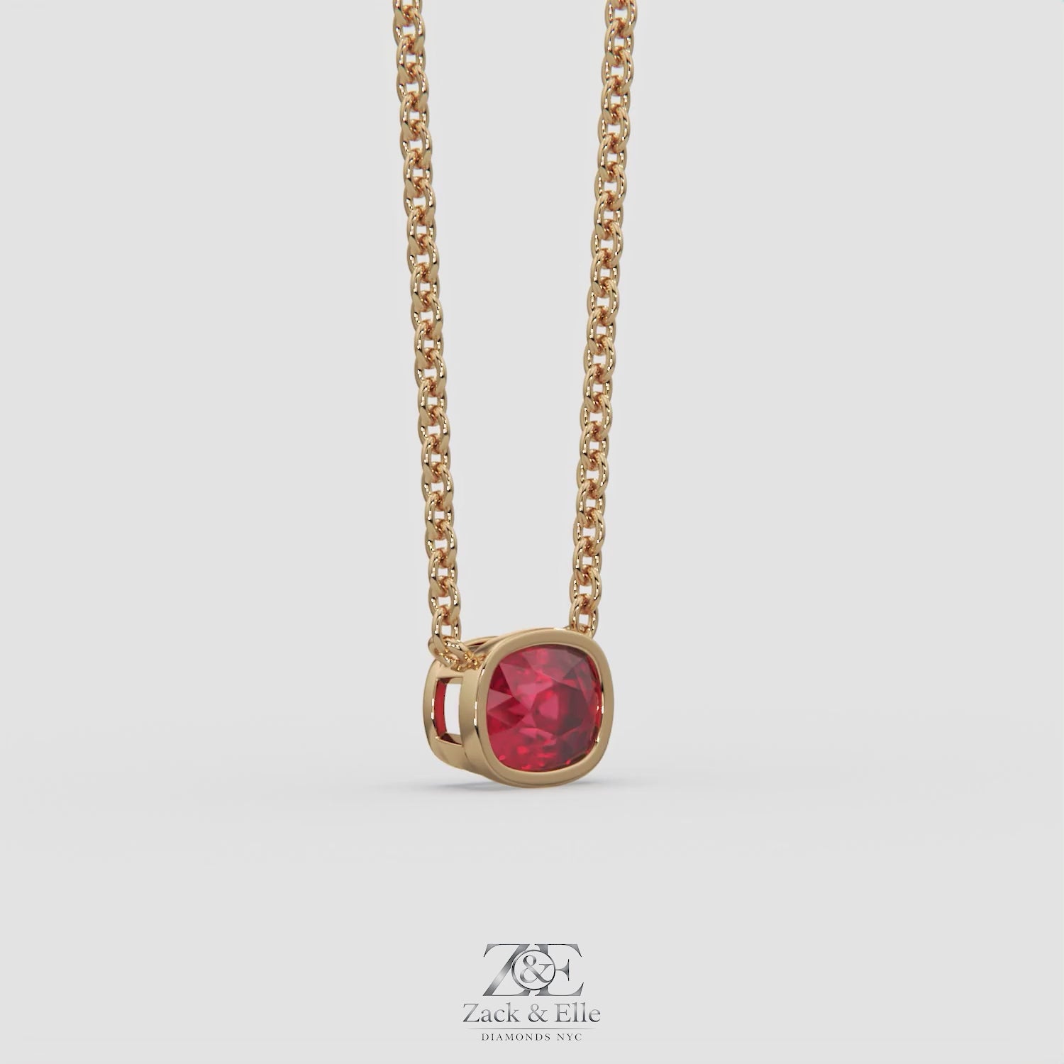 3.00 Ct Cushion Red Ruby East West Pendant, in yellow gold, 360 spin