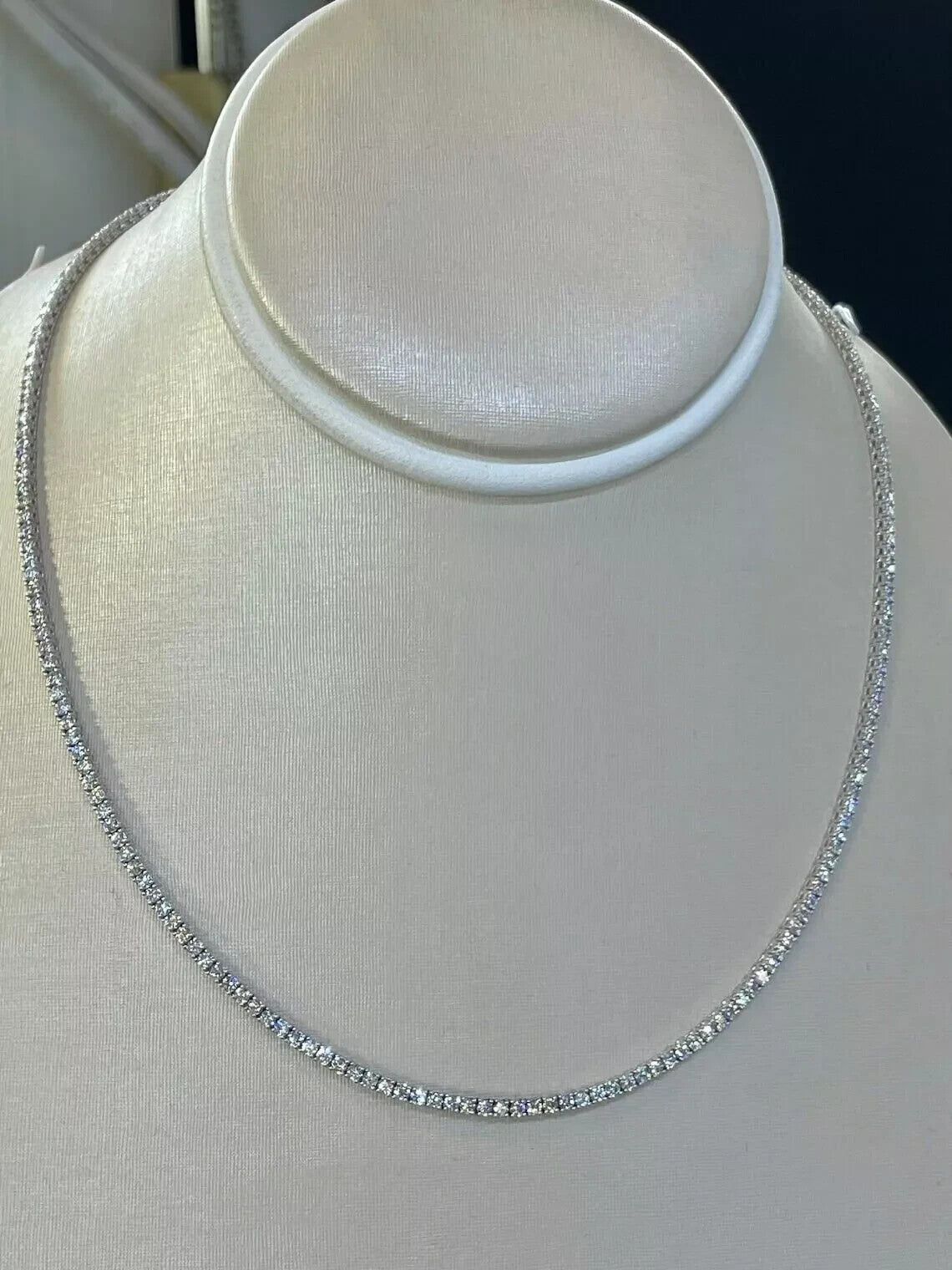 7 carat lab grown diamond tennis necklace displayed on a jewelry bust, 14K white gold, 16 inch length