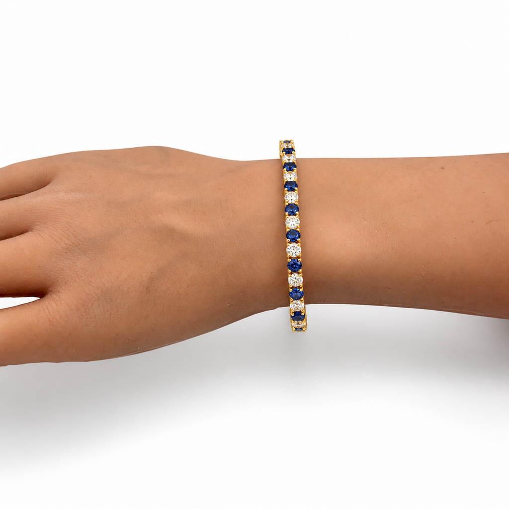 10.00 CTW Round Blue Sapphire and Diamond Tennis Bracelet, in yellow gold, on hand