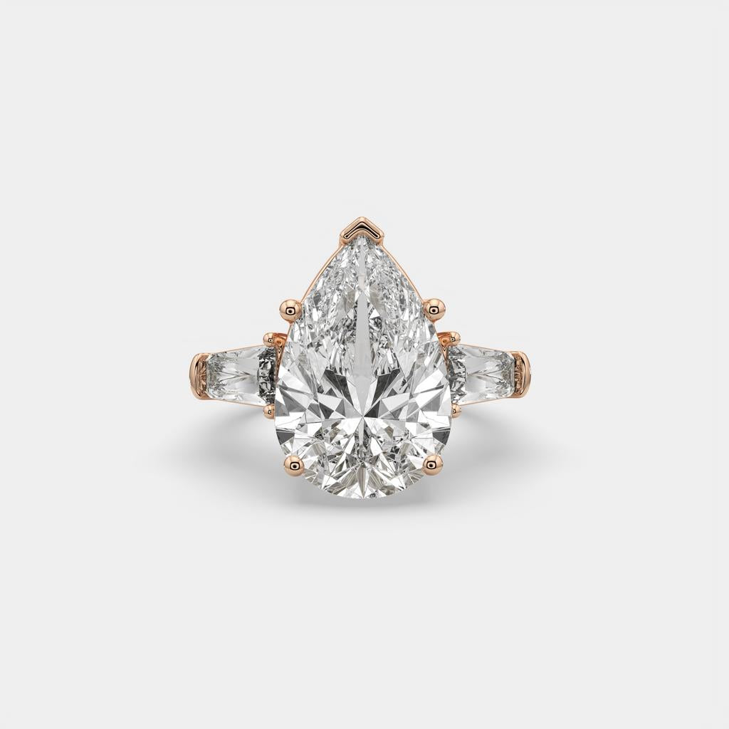 11.50 Ct F Color VS1 Pear Shape Diamond Three Stone Ring With Tapered Baguettes, in rose gold, front view