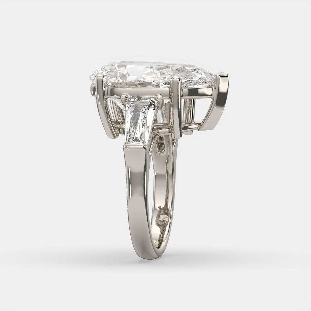 11.50 Ct F Color VS1 Pear Shape Diamond Three Stone Ring With Tapered Baguettes, in white gold, side profile