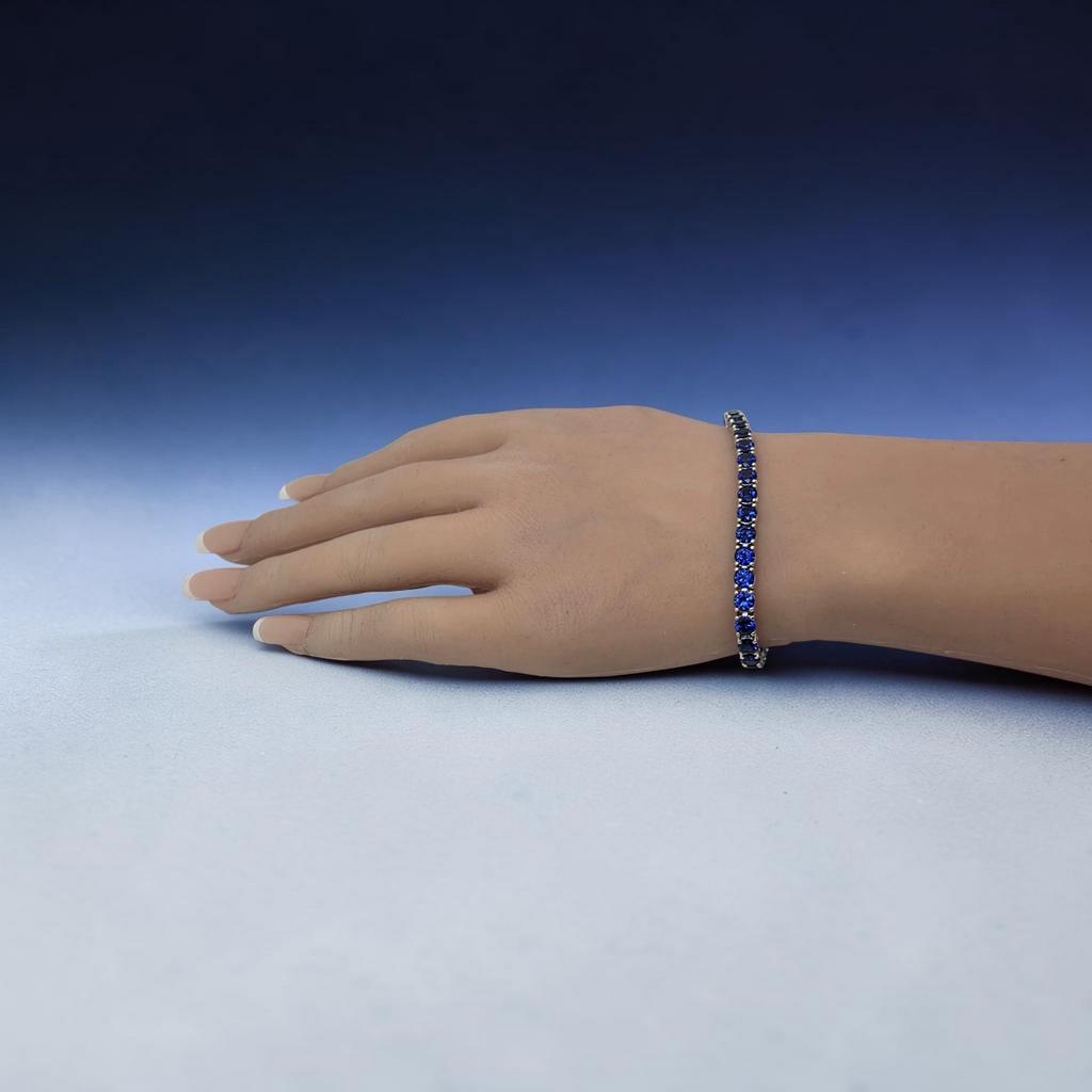 16 CTW Round Blue Sapphire Tennis Bracelet, in white gold, on hand