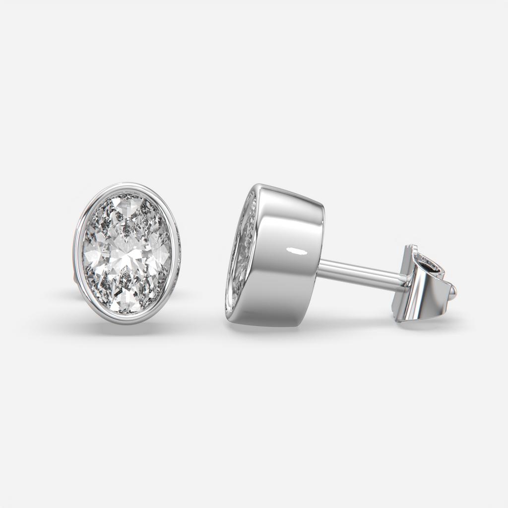2.00 Ct E VS1 Oval Cut Full Bezel Diamond Studs, in white gold, side profile