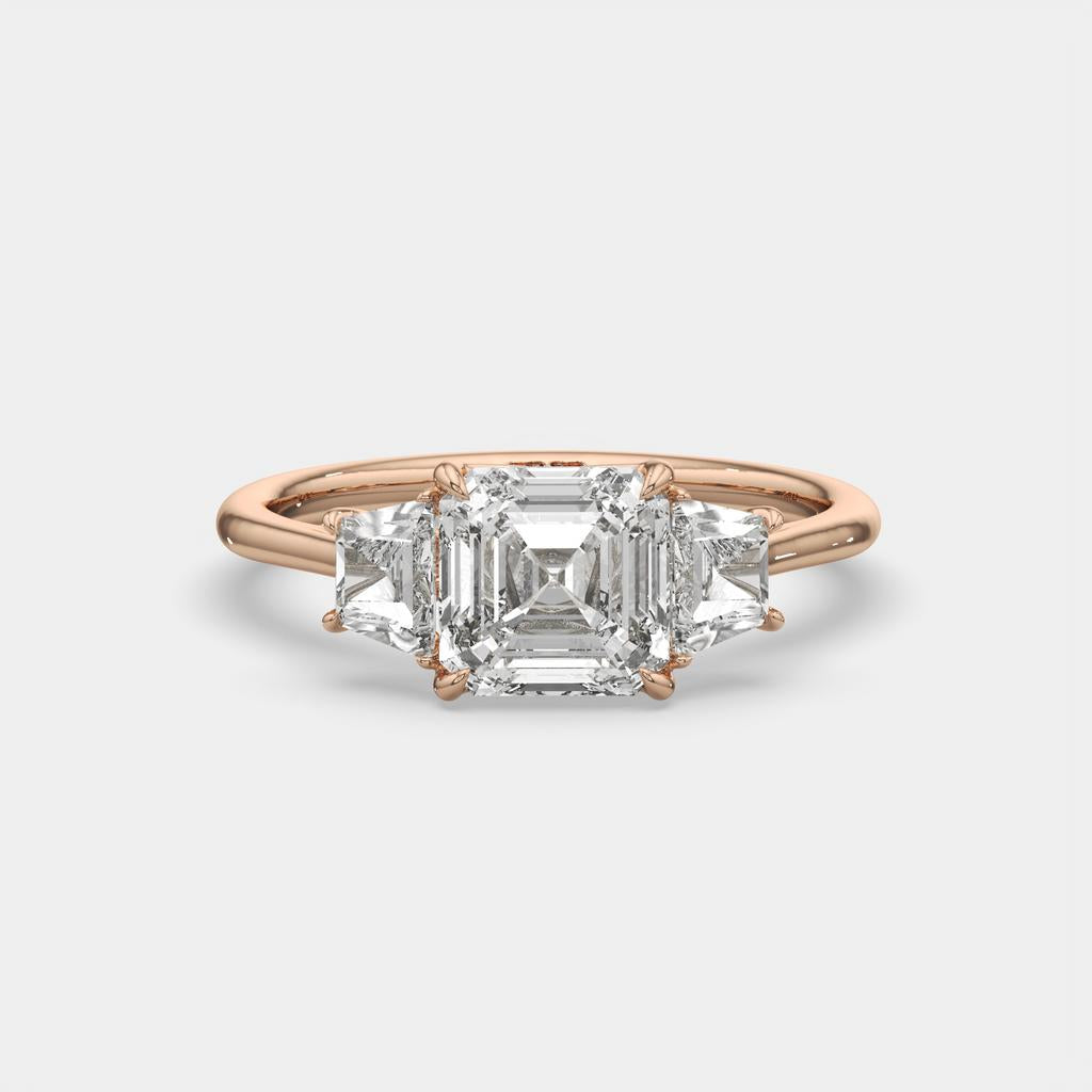 2.50 Ct D VS1 Asscher Cut Three Stone Ring With Step Cut Trapezoid Accents, in rose gold, front view