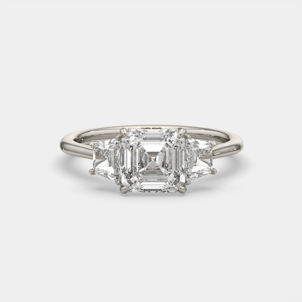 2.50 Ct D VS1 Asscher Cut Three Stone Ring With Step Cut Trapezoid Accents, in white gold, front view
