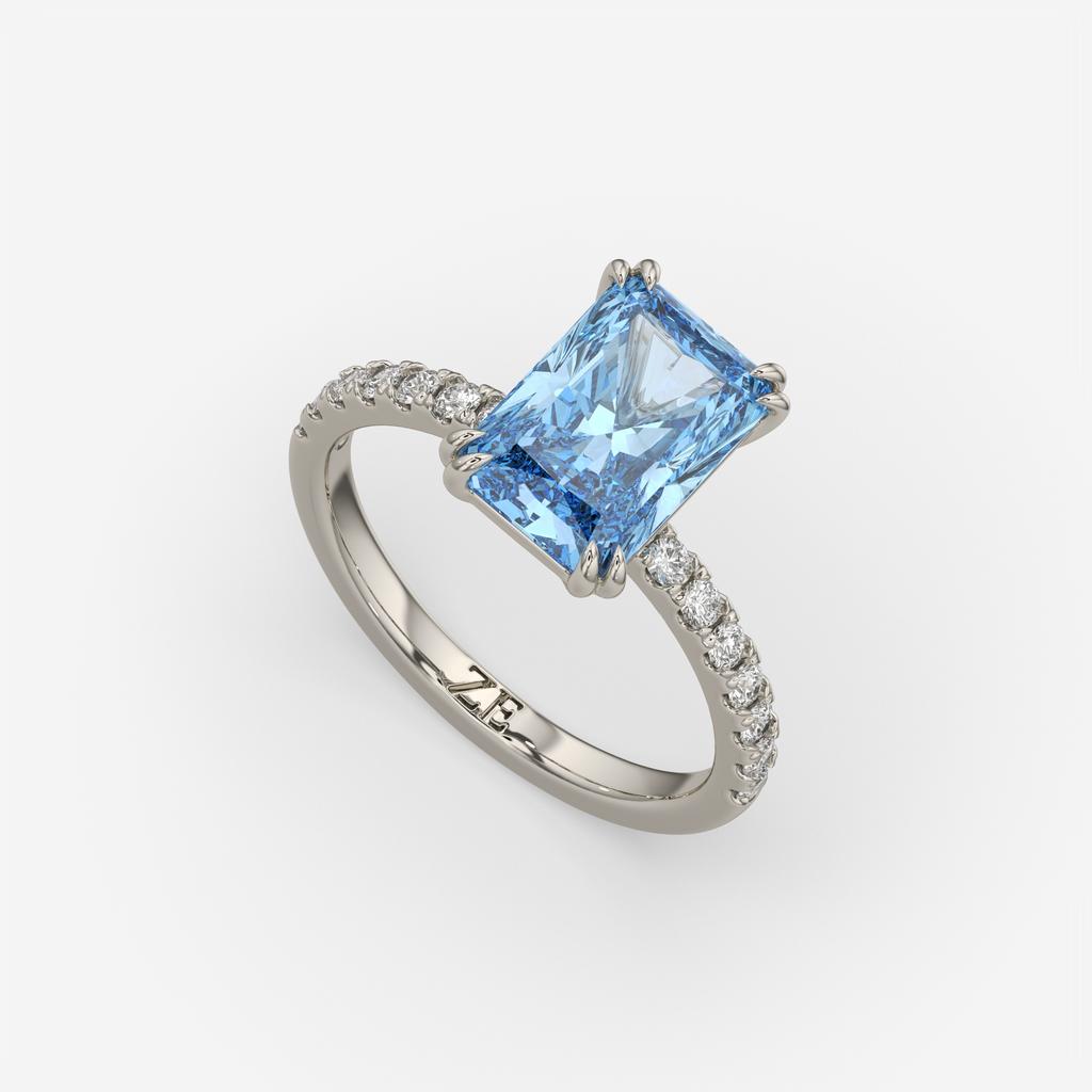 3.30 Ct Fancy Vivid Blue VS2 Radiant Lab-Grown Diamond Ring with Round Accents, in white gold, front view