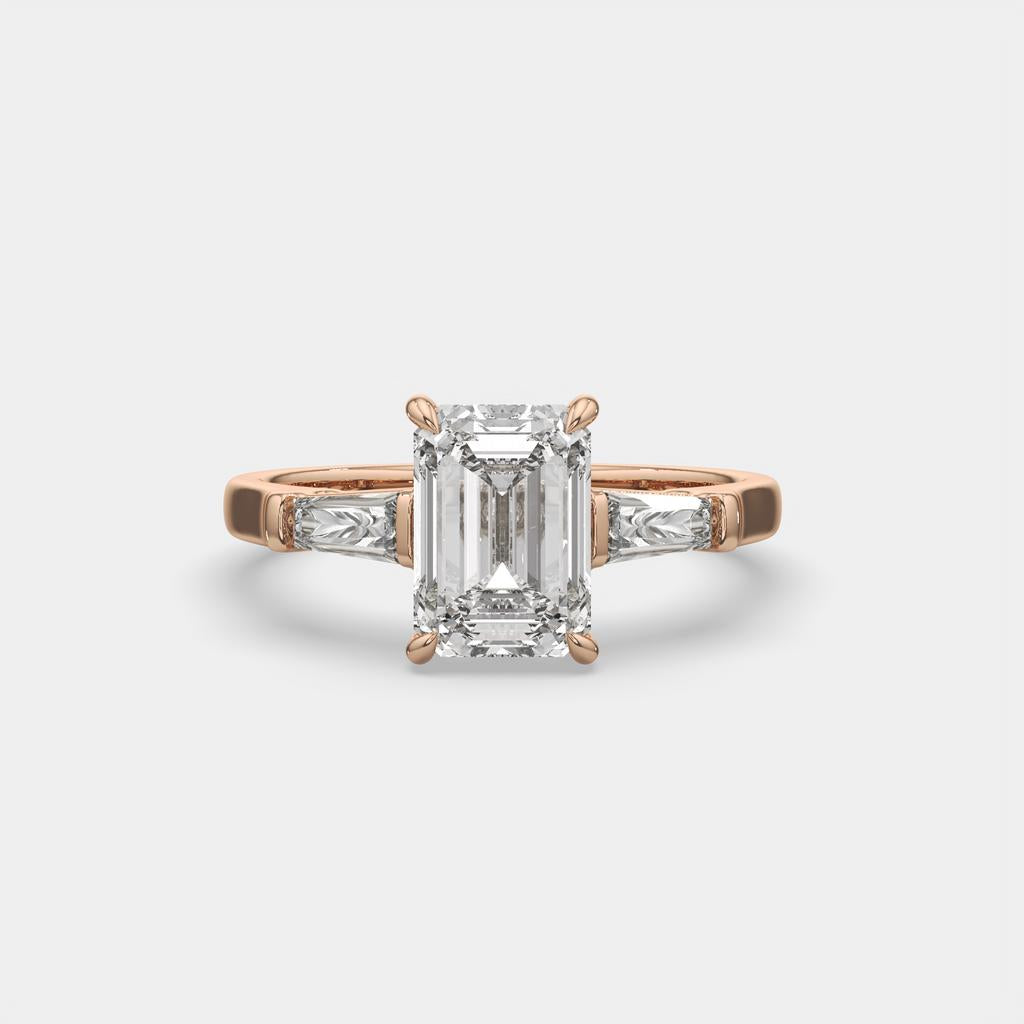 3.50 Ct D Color VS1 Emerald Cut Three Stone Diamond Ring With Tapered Baguettes, in rose gold, front view