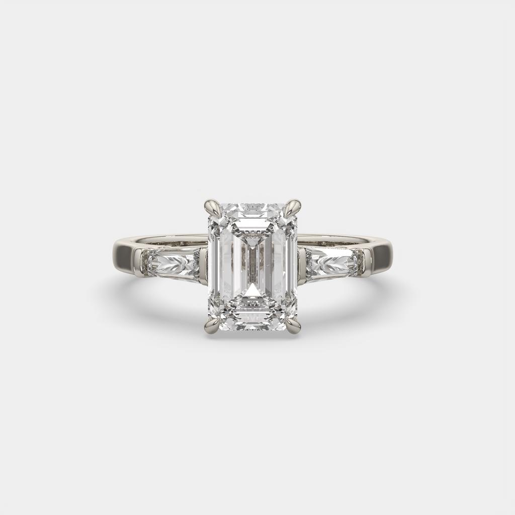 3.50 Ct D Color VS1 Emerald Cut Three Stone Diamond Ring With Tapered Baguettes, in white gold, front view