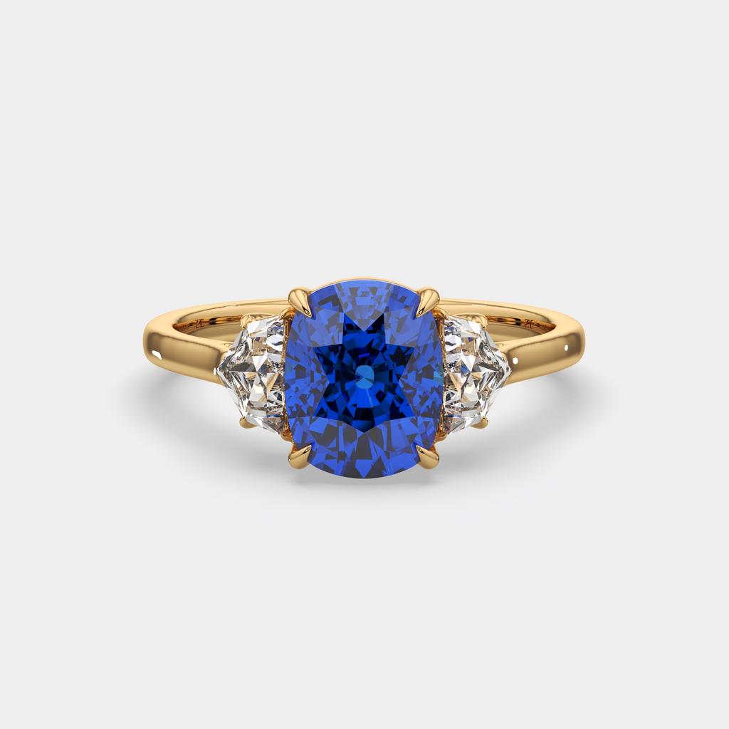 4.00 Ct Cushion Blue Sapphire and Diamond Three Stone Ring, in yellow gold, front view
