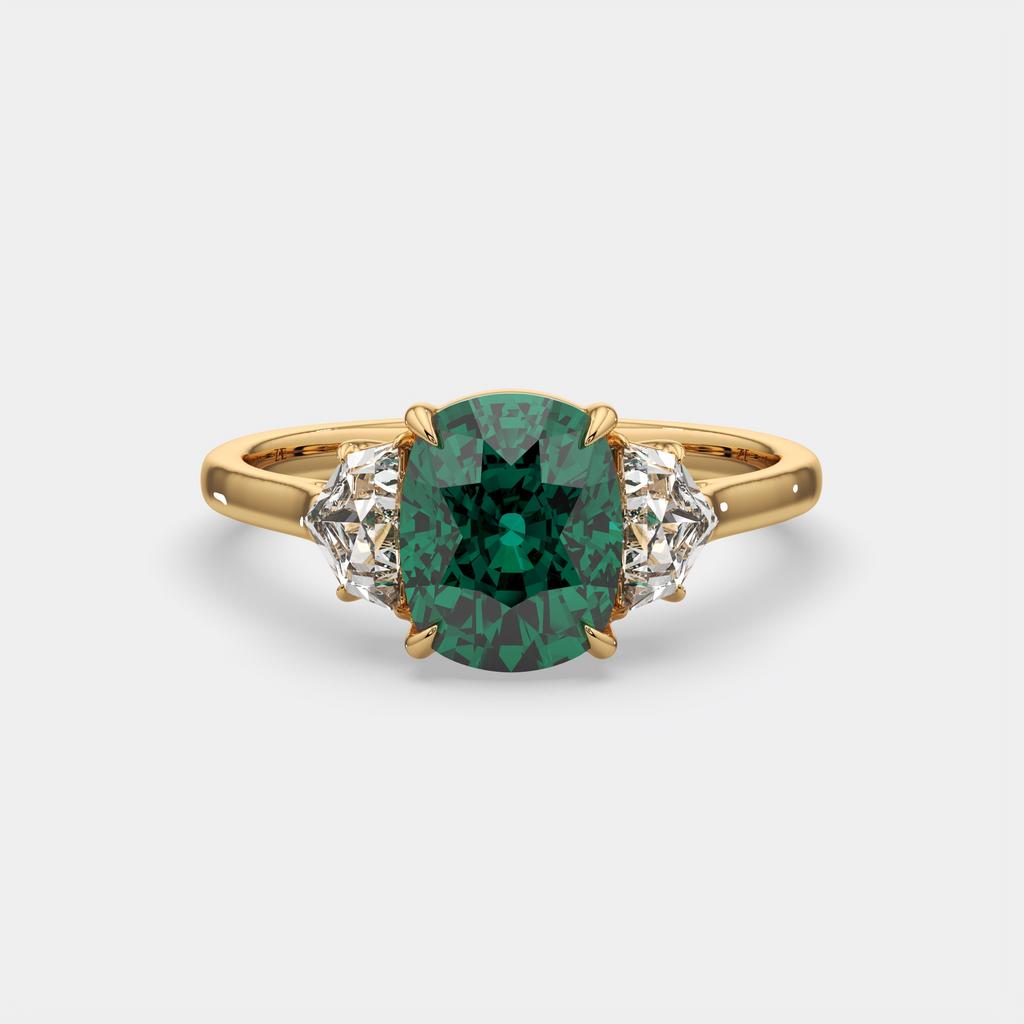 4.00 Ct Cushion Green Emerald and Diamond Three Stone Ring, in yellow gold, front view