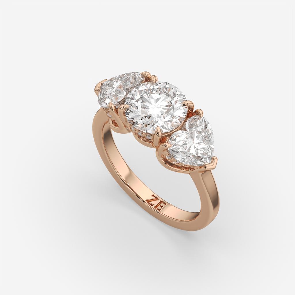 4.15 Ct D VS1 Round 3 Stone Ring With Heart Shape Accents and Halo, in rose gold, front view