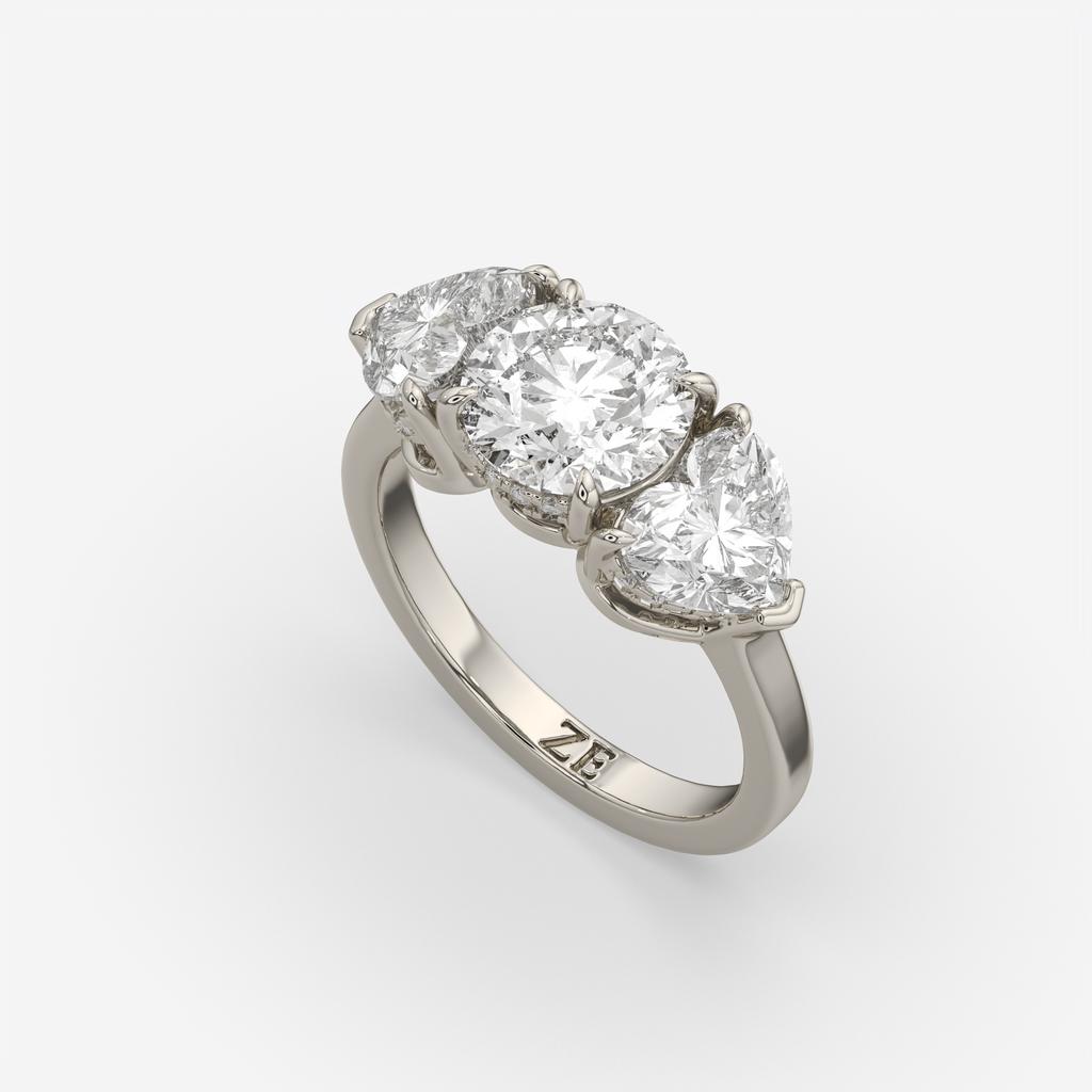 4.15 Ct D VS1 Round 3 Stone Ring With Heart Shape Accents and Halo, in white gold, front view