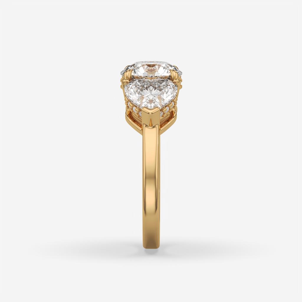 4.15 Ct D VS1 Round 3 Stone Ring With Heart Shape Accents and Halo, in yellow gold, side profile