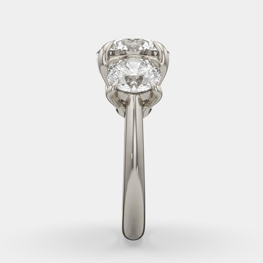 5.00 Ct E VS1 Round Diamond Three Stone Ring, in white gold, front view