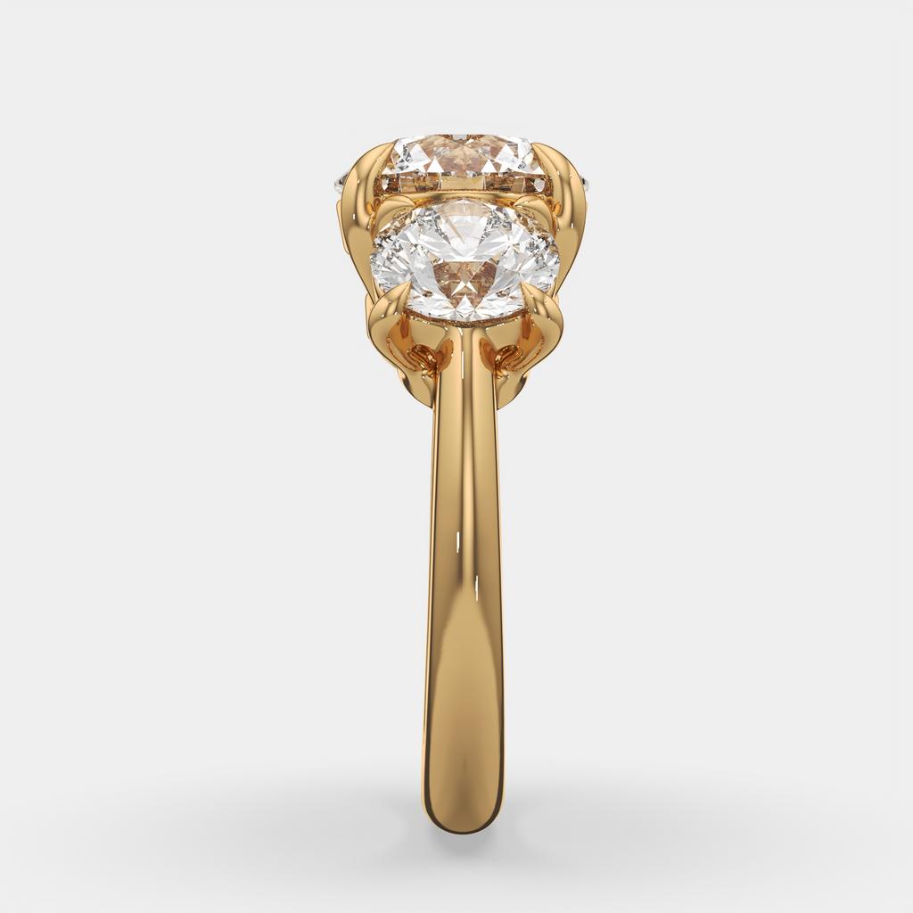 5.00 Ct E VS1 Round Diamond Three Stone Ring, in yellow gold, front view