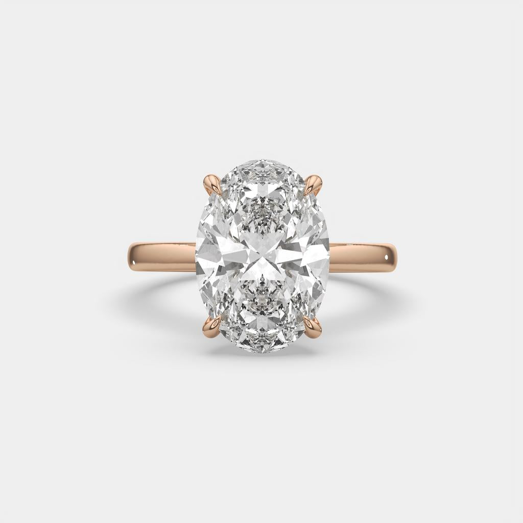5.15 Ct E VS1 Oval Lab Grown Diamond Halo Ring, in rose gold, front view