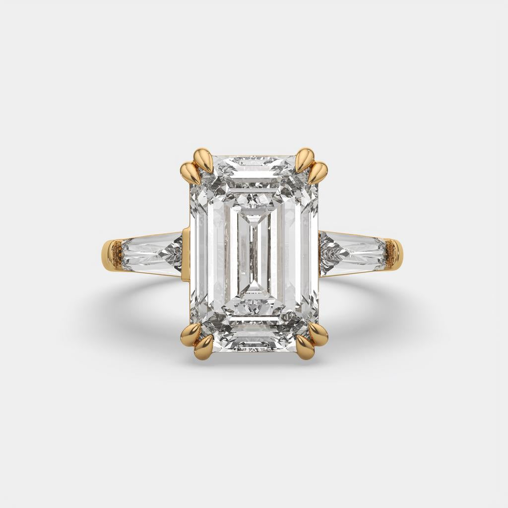 6.70 Ct F VS1 Emerald Cut Three Stone Diamond Ring With Tapered Baguettes, in yellow gold, front view