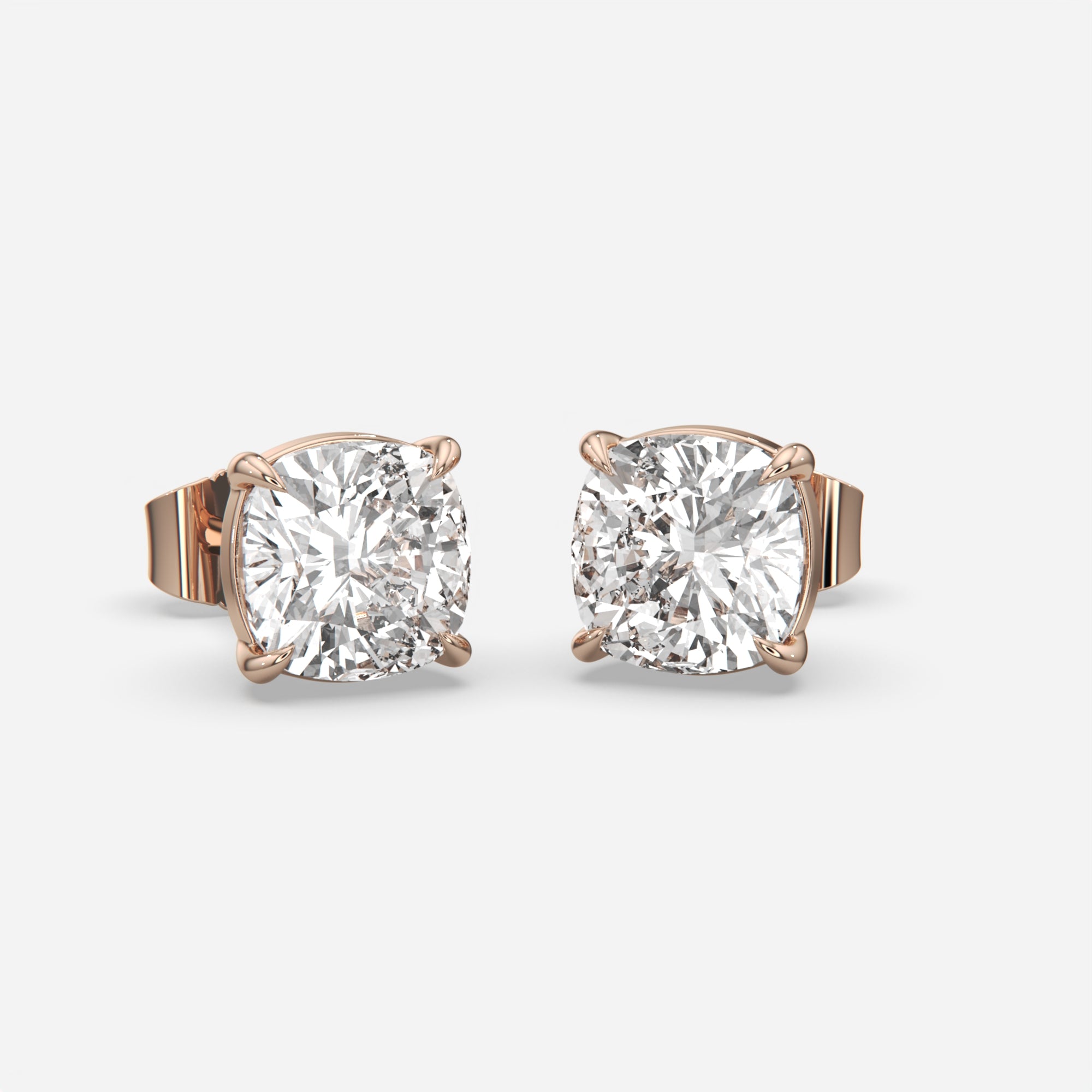 6.00 Ct Cushion Cut Eagle Claw Diamond Studs, eagle claw setting, in 14k rose gold, pair, front view (2)