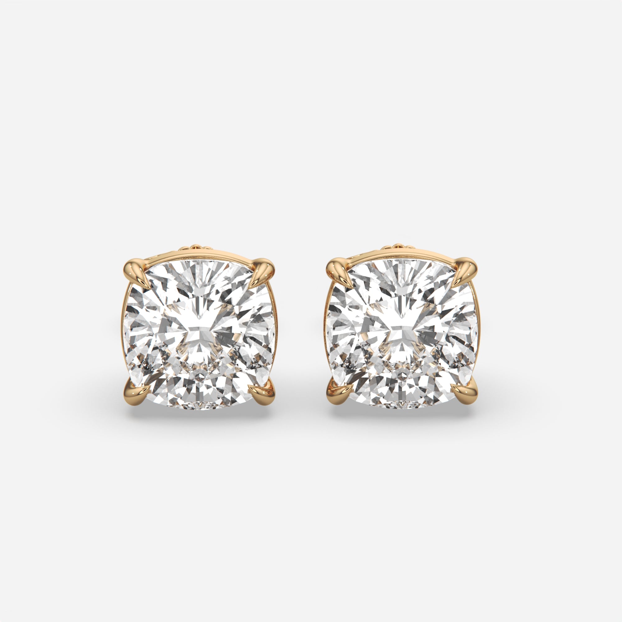 6.00 Ct Cushion Cut Eagle Claw Diamond Studs, eagle claw setting, in 14k yellow gold, pair, front view