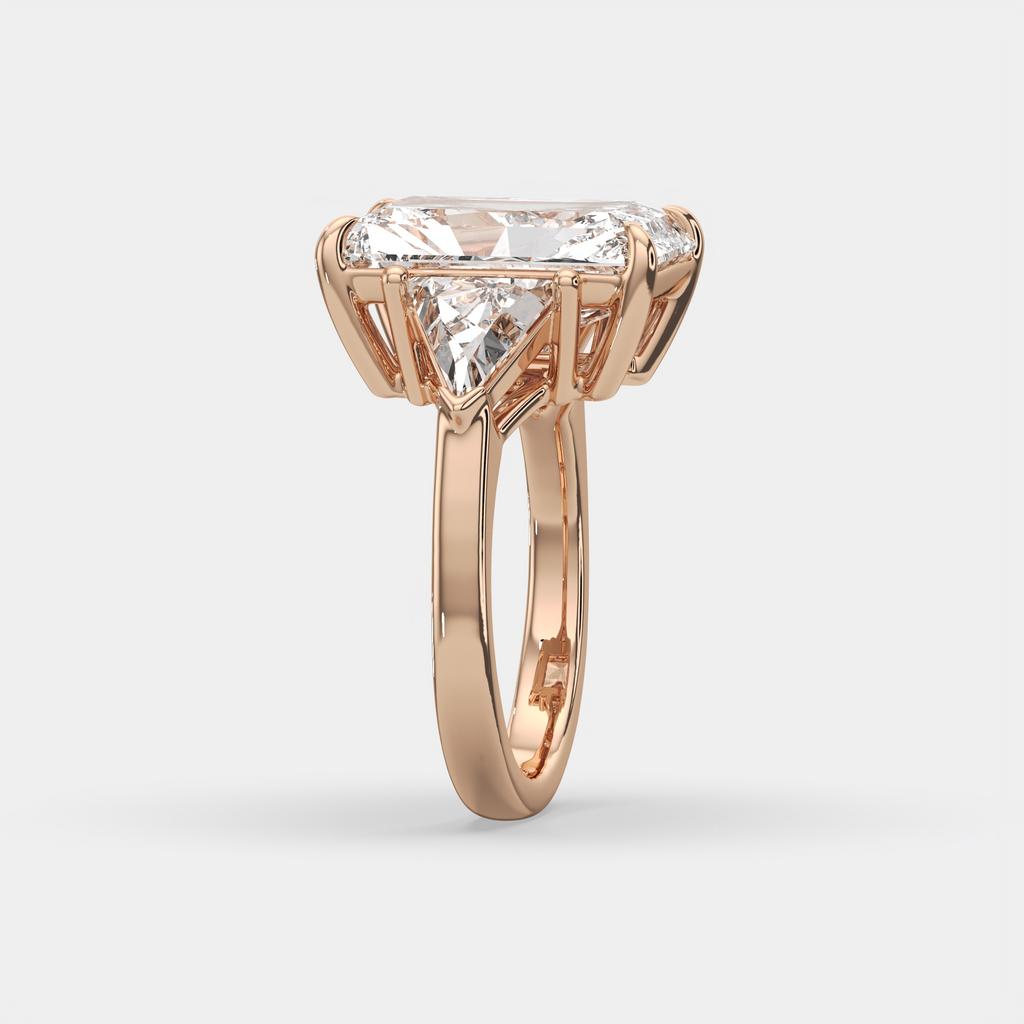 7.20 Ct E VS1 Radiant Cut Lab-Grown Diamond Three Stone Ring with Trapezoid Side Diamonds, in rose gold, side profile