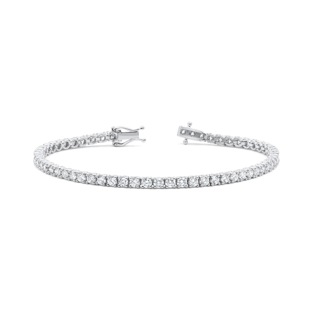 Tapered Four Prong Diamond Tennis Bracelet in White Gold