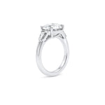 Load image into Gallery viewer, 3.57 Carat Round Diamond Three Stone Engagement Ring with Tapered Baguettes in Platinum
